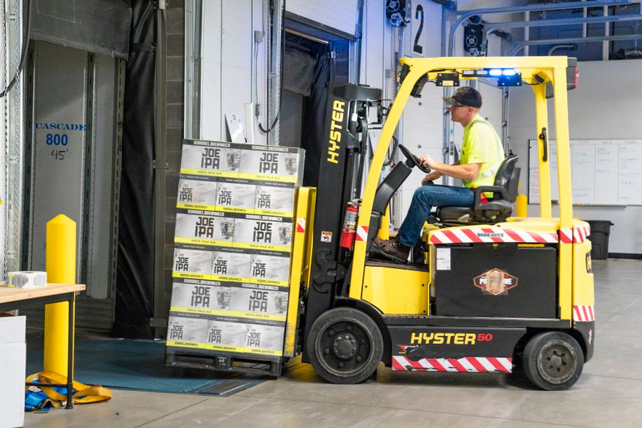 Forklift unloading a delivery at the loading dock