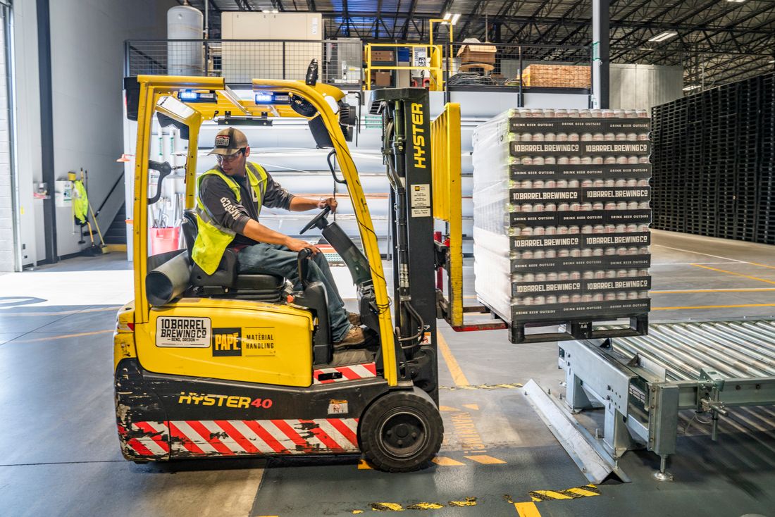 Forklift loading materials in a warehouse