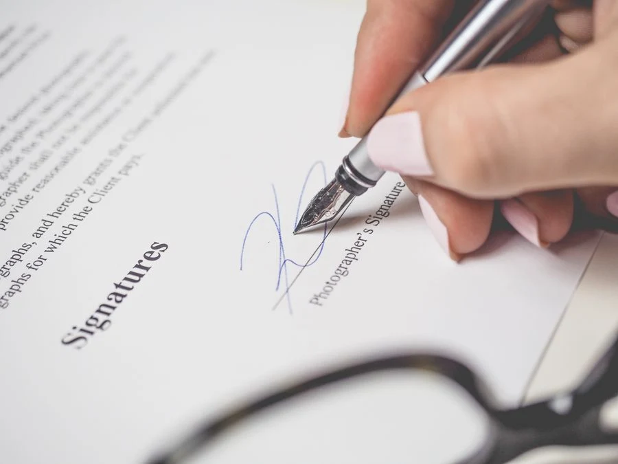 Signing a contract document