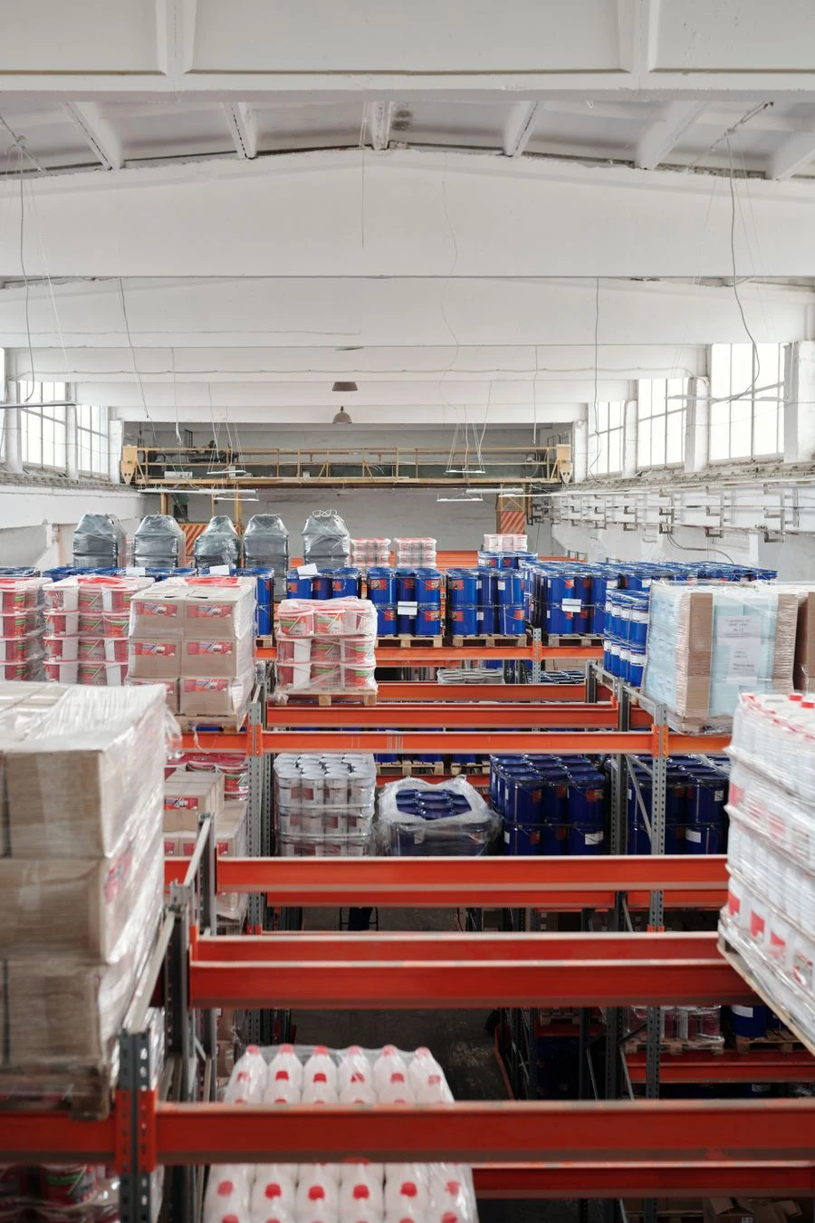 Palletised building materials in a warehouse