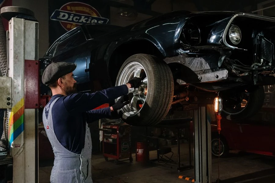 Mechanic servicing a company vehicle