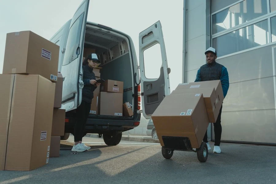 Van being loaded with materials for a site delivery