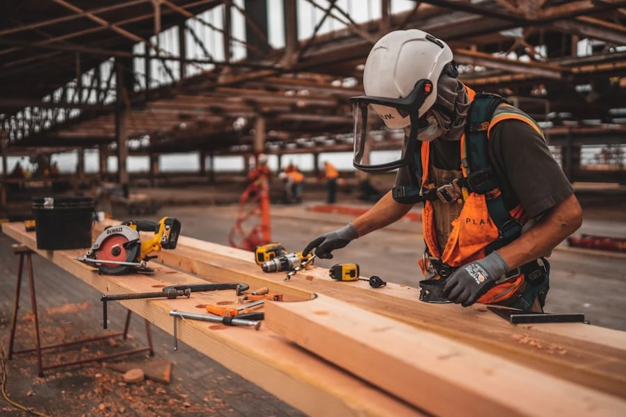 Carpenter using a power tool