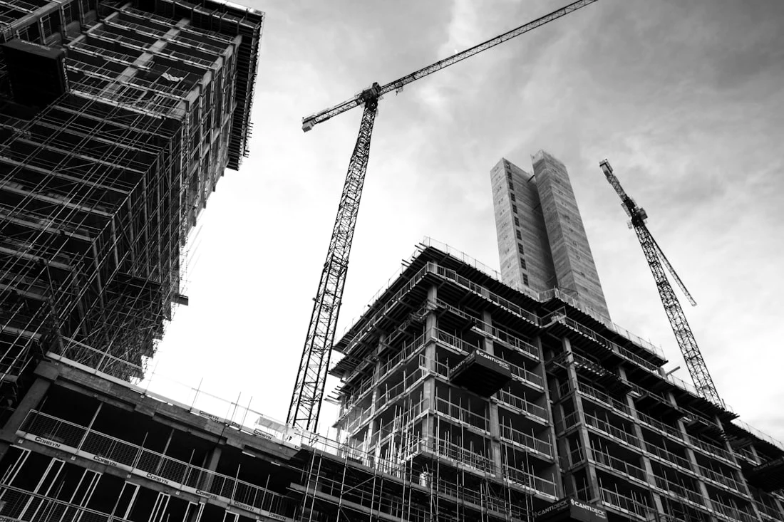 High-rise construction with tower cranes